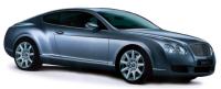 Всем своим обличьем Continental GT показывает, что фирма Bentley стремится разорвать корни, связывающие ее с Rolls-Royce.